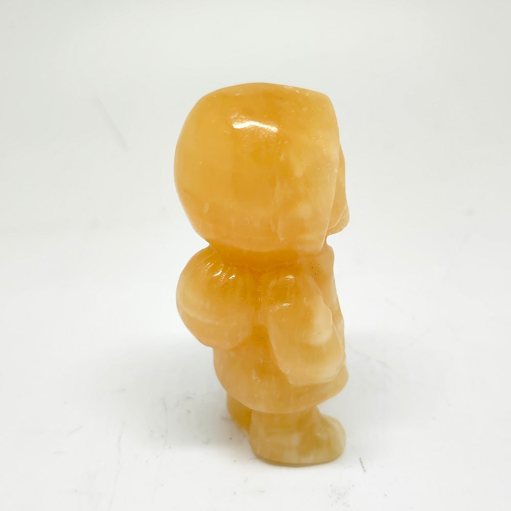 123g natural orange calcite skull Jack carving ornaments healing