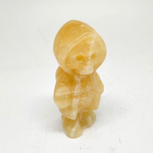 123g natural orange calcite skull Jack carving ornaments healing